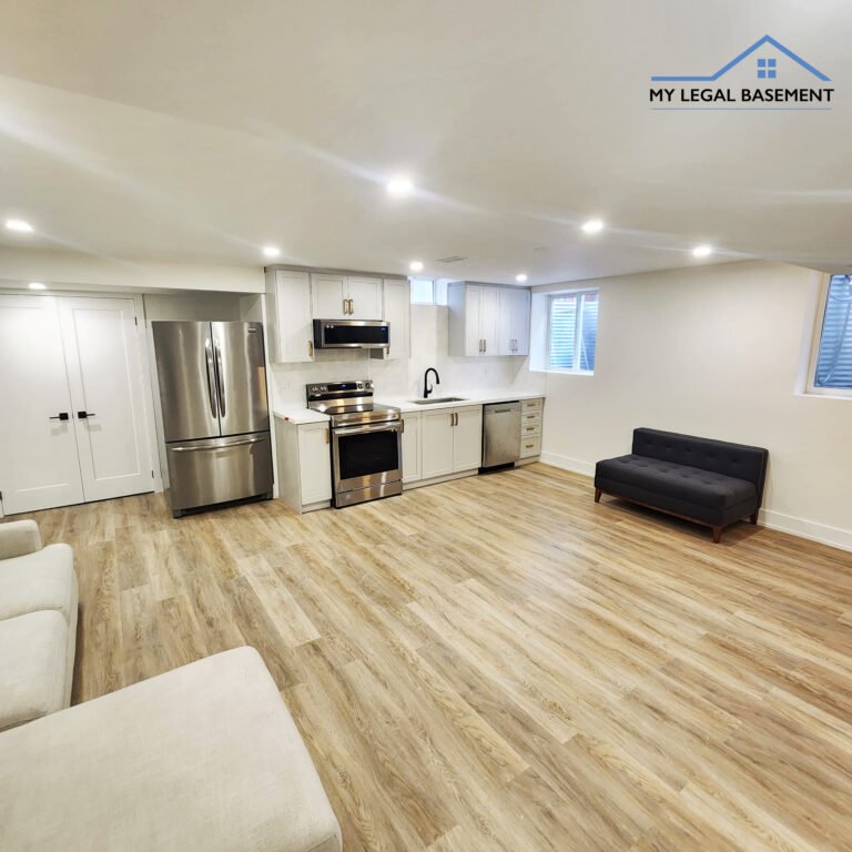 Measuring tape showing basement ceiling height in a finished legal suite in Ontario